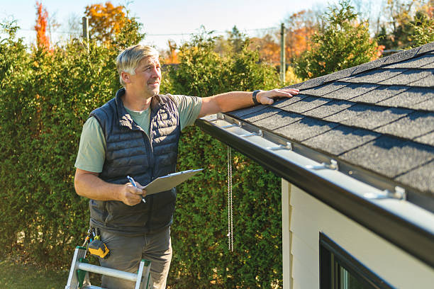 Professional Metal Roofing technician working in Hilham, TN